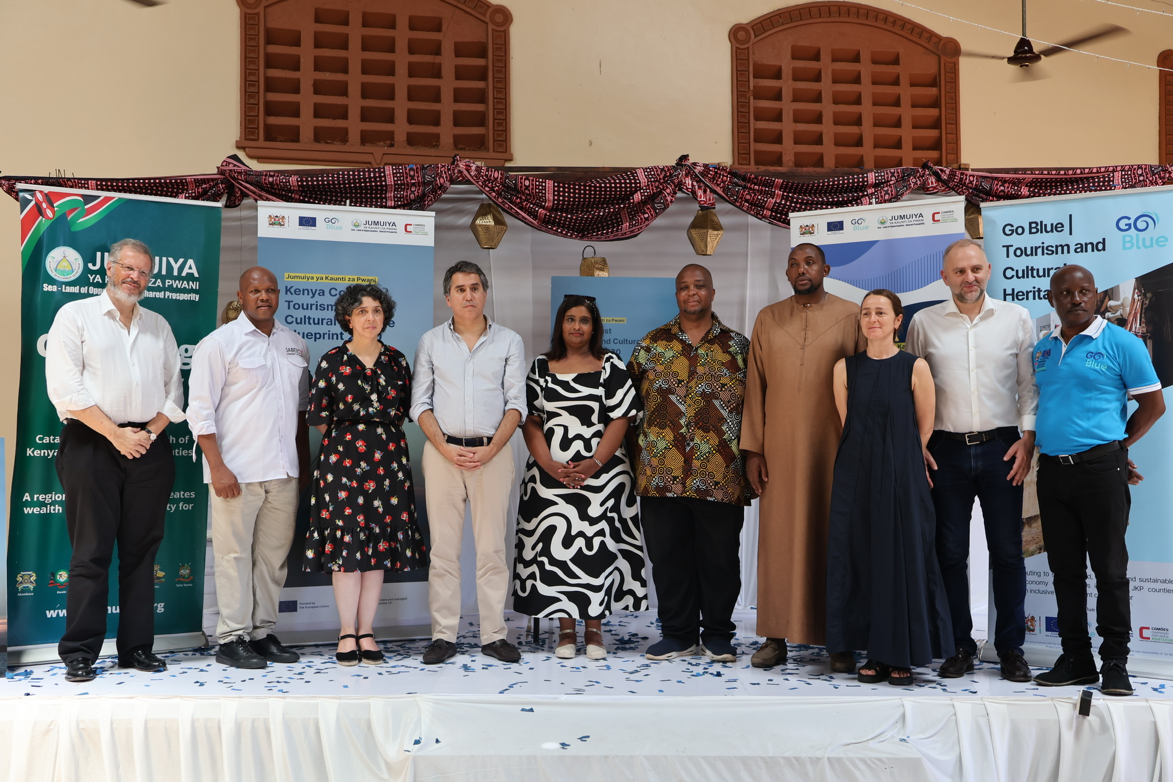Paula, the TCH project manager posing for a picture with the team from Portugal