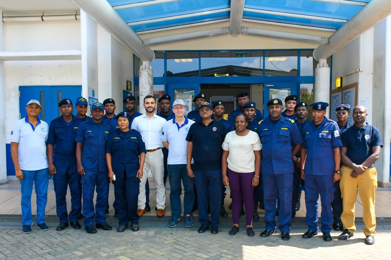 The team pose for a photo